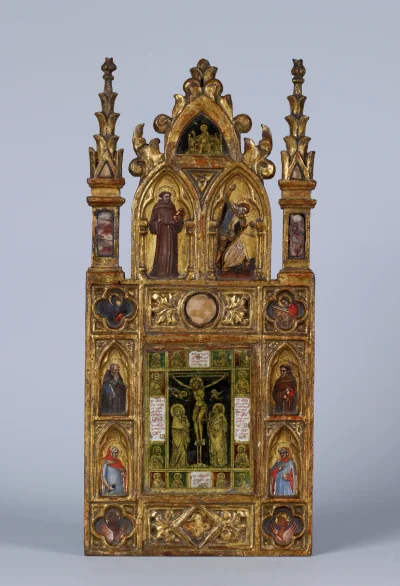 Aile d'un diptyque de reliquaire avec la Crucifixion et des saints — Tommaso da Modena ; Italian (1343) — tempera and gold leaf on panel with marble, ceramic, and verre églomisé insets on a gilded wood frame, Walters Art Museum, Baltimore