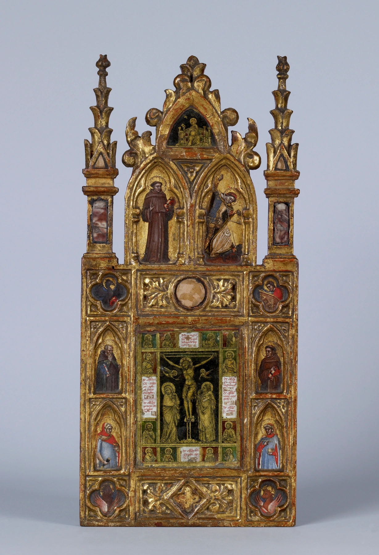 Aile d'un diptyque de reliquaire avec la Crucifixion et des saints
